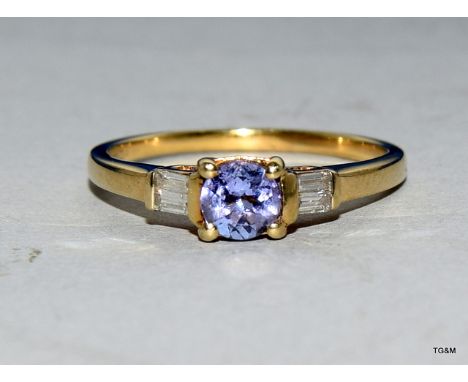 Tanzanite & baguette diamond shouldered 9ct ruby ring