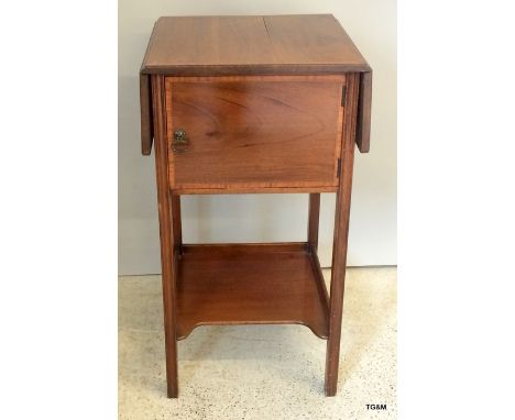 An Edwardian inlaid mahogany bedside table  with twin flaps and 1 cupboard 75 x 40 x 40cm