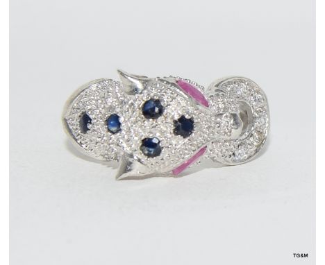 a silver panther ring set with Cz and with ruby eyes
