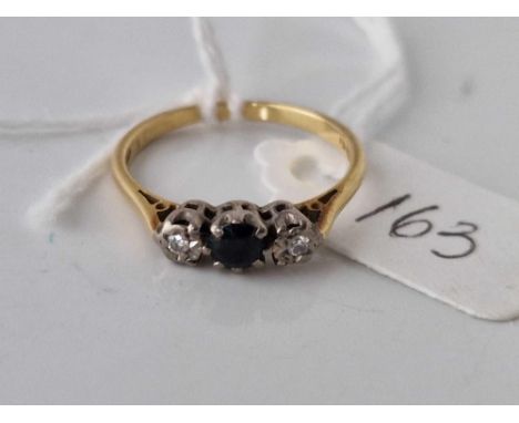 A sapphire and diamond three stone ring 18ct gold size L 3 gms