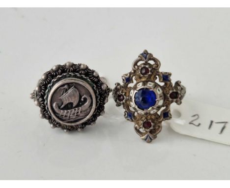 A silver paste and enamel ring and Danish example