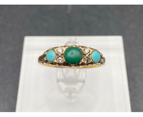 A Victorian turquoise diamond ring in hand carved mount 9ct size N 2.6 gms  