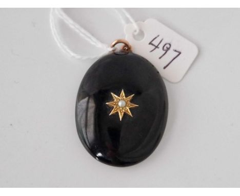 A gold mounted get and pearl pendant
