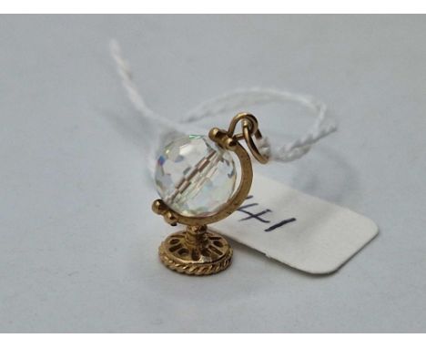 A globe charm with spinning crystal 9ct