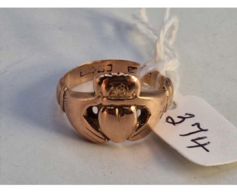 A heavy rose gold hand and heart ring, 9ct, 5.8 g, size P
