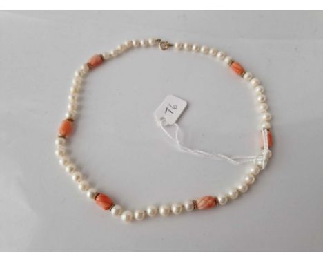 A pearl and coral necklace with 9ct clasp 15 inch