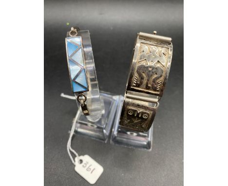 A solid silver Aztec panelled bracelet &amp; an Enamelled example