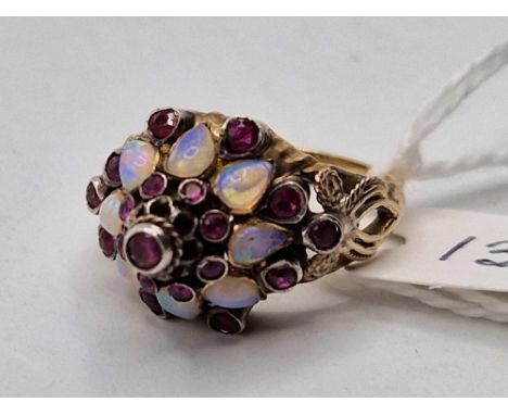A opal and ruby dome shaped ring 14ct gold size M 4.7 gms