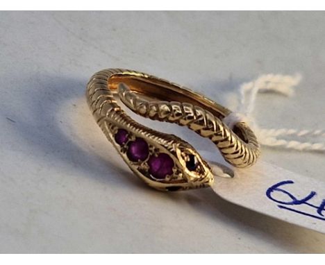 A vintage snake ring set with rubies and sapphires 9ct size P 4.4g