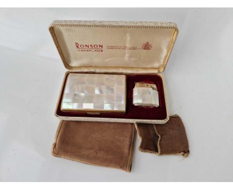 A boxed Ronson compact and lighter set