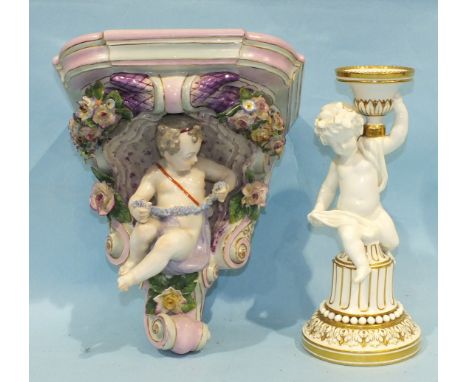 A Minton's late-19th/early-20th century candle holder/sconce supported by a cherub seated on a plinth, 25cm high and a Contin