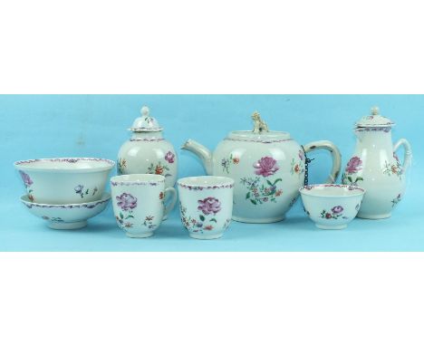 An 18th century Chinese famille rose part tea service decorated with scattered flowers, comprising teapot and cover, teapoy a