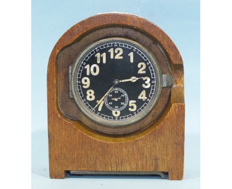 A WWII German Heereseigentum duty clock with black 6.5cm circular numerical dial, subsidiary seconds dial, set within arch-to