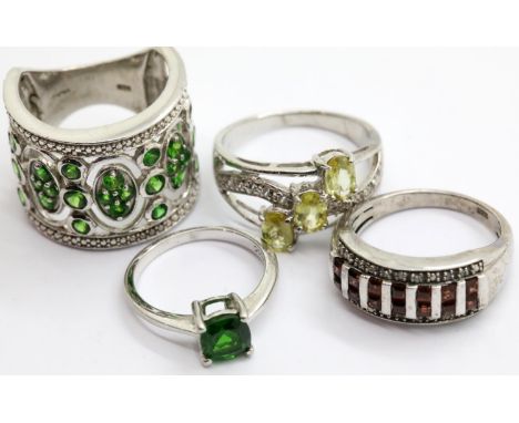 Four silver assorted stone set rings. P&amp;P Group 1 (£14+VAT for the first lot and £1+VAT for subsequent lots) 
