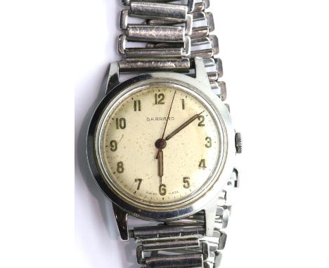 Garrard boxed steel cased ICI presentation wristwatch, inscribed for 1961. P&P Group 1 (£14+VAT for the first lot and £1+VAT 