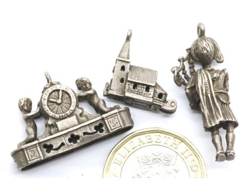 Three silver vintage assorted charms. P&amp;P Group 1 (£14+VAT for the first lot and £1+VAT for subsequent lots) 