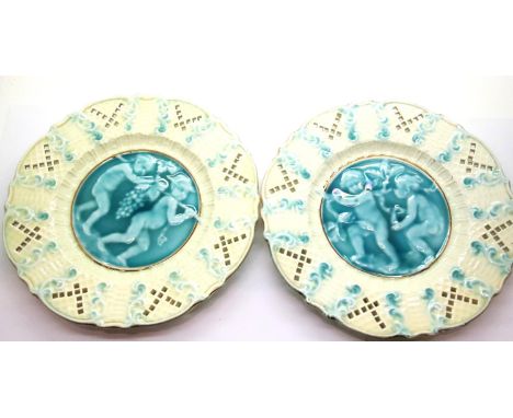 Pair of Villeroy & Boch? pate-sur-pate pierced plates featuring cherubs, D: 19.5 cm. P&P Group 3 (£25+VAT for the first lot a