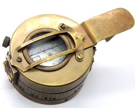 Brass cased compass marked TG London, D: 6.5 cm. P&amp;P Group 1 (£14+VAT for the first lot and £1+VAT for subsequent lots) 