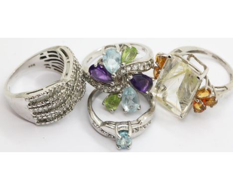 Four silver assorted stone set rings. P&amp;P Group 1 (£14+VAT for the first lot and £1+VAT for subsequent lots) 