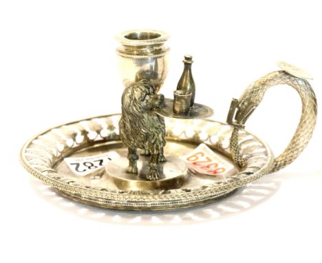 Unusual Italian silver chamber stick, featuring a spaniel carrying wine tray with bottle and glass, c1830, 427g. P&amp;P Grou