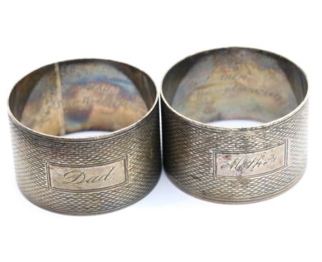 Two hallmarked silver napkin rings, mother and dad, combined 60g. P&amp;P Group 1 (£14+VAT for the first lot and £1+VAT for s