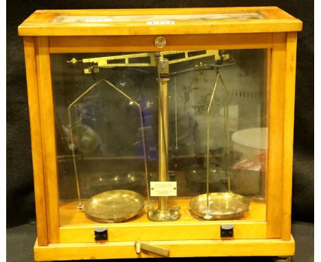 Pair of balancing scales in wood/glass box. Not available for in-house P&amp;P 