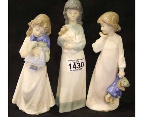 Three Nao girl figures. P&amp;P Group 2 (£18+VAT for the first lot and £3+VAT for subsequent lots) 