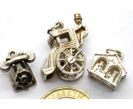 Three vintage silver charms. P&amp;P Group 1 (£14+VAT for the first lot and £1+VAT for subsequent lots) 