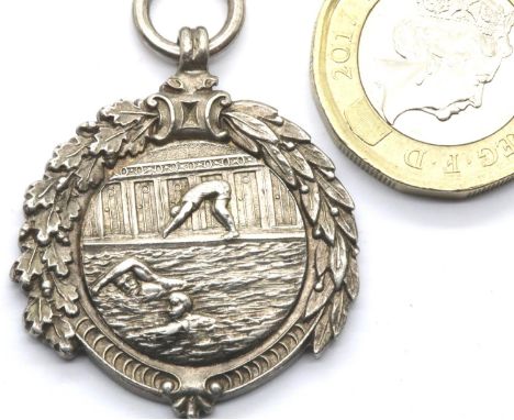 Hallmarked silver swimming medal, inscribed and dated 1921. P&amp;P Group 1 (£14+VAT for the first lot and £1+VAT for subsequ