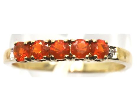 9ct gold ring with five orange stones and diamonds, size O, 1.6g. P&amp;P Group 1 (£14+VAT for the first lot and £1+VAT for s