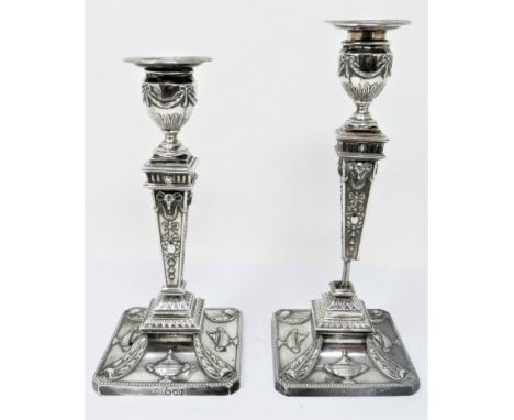 A PAIR OF VICTORIAN SILVER CANDLESTICKS, WILLIAM HUTTON &amp; SONS LTD, LONDON, 1895 die-stamped in the style of Sheffield or