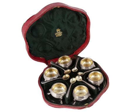 A SET OF SIX VICTORIAN SILVER SALT CELLARS AND FOUR SALT SPOONS, ROBERT HARPER, LONDON, 1864 cauldron form, each with a mille