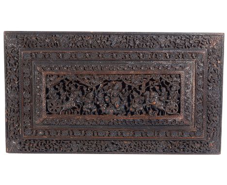 A CARVED SANDALWOOD PANEL, MYSORE, SOUTH INDIA, CIRCA 1880 originally a lid from a casket, of rectangular form, the central p