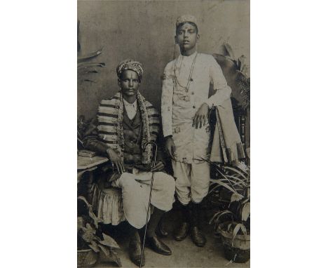 THREE INDIAN PORTRAIT PHOTOGRAPHS, EARLY 20TH CENTURY one depicting a Tibetan woman, labelled 'Darjeeling', another depicting