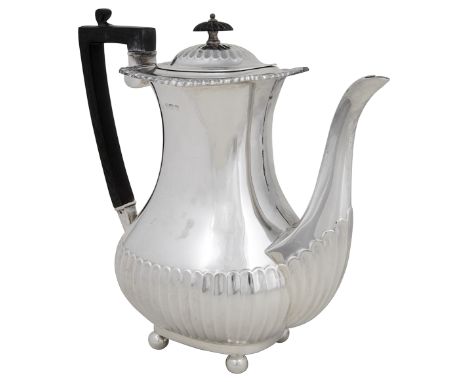 A GEORGE V SILVER COFFEE POT, WILLIAM HUTTON &amp; SONS LTD., SHEFFIELD, 1912 part lobed baluster pattern, gadroon and shell 