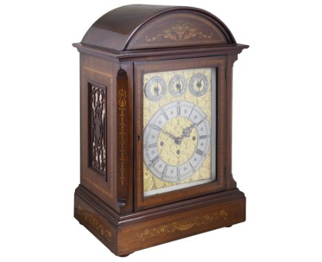 AN EDWARDIAN INLAID MAHOGANY 'DIRECTOR'S' BRACKET CLOCK, CIRCA 1905 the rectangular case with rounded arch top, decorated wit