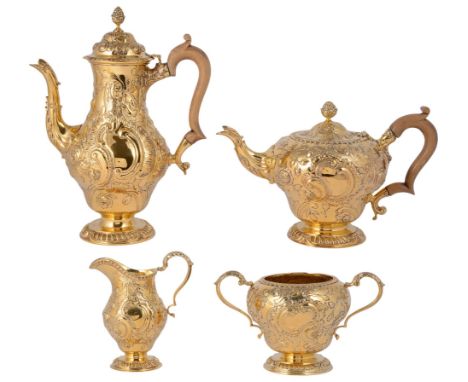 AN EDWARDIAN SILVER-GILT FOUR-PIECE TEA AND COFFEE SET, D. &amp; J. WELLBY LTD., LONDON, 1901/02/05 in George III Rococo styl