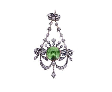 BELLE EPOCH DEMANTOID AND DIAMOND PENDANT, 1890s the cushion-shaped demantoid garnet millegrain set between bow and swag deco