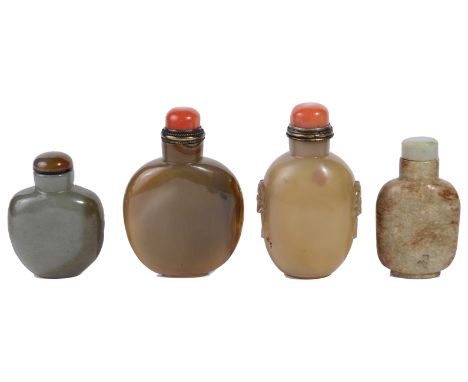 ˜A STUDY GROUP OF FOUR CHINESE SNUFF BOTTLES comprising: a jade bottle and jade stopper; a large agate bottle carved with 'ta