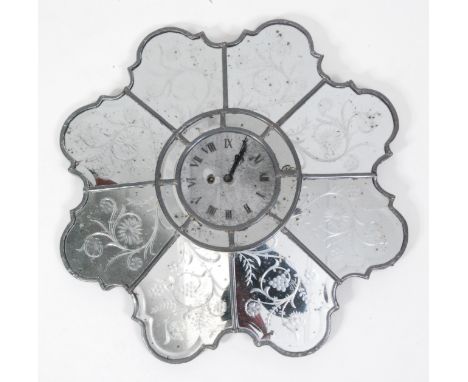 A circa 1900 Venetian mirrored glass flower wall clock, the clock face within a surround of eight glass 'petals', each wheel 