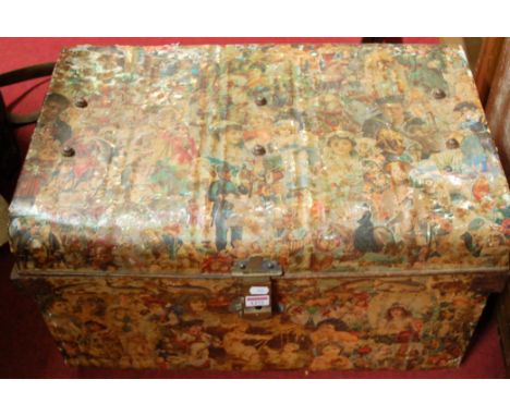A Victorian decoupage clad metal hinged top travelling trunk, having end carry handles, w.66.5cm