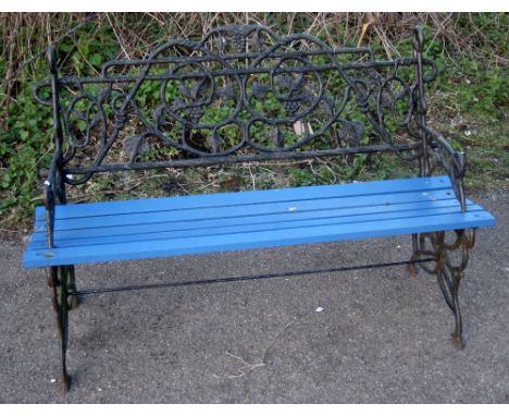 Cast metal and painted wooden slat garden bench Wood is solid, bench with slight wobble, repaired to left hand side at back o