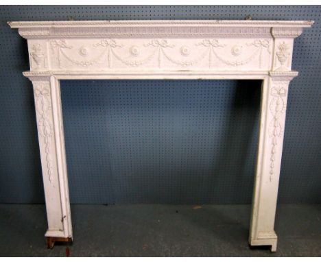 White painted wood fire surround with moulded decoration 