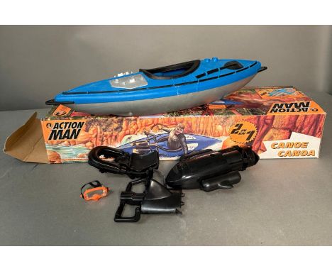 A boxed Action Man canoe