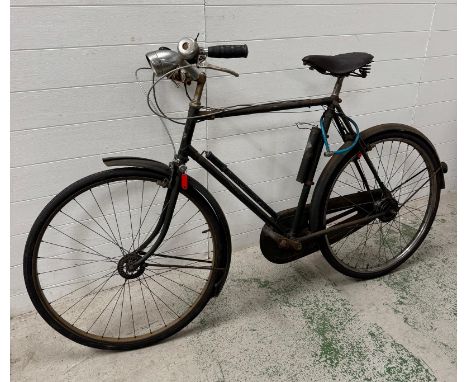 A vintage Raleigh bike with leather Brooks seat and original dynamos 