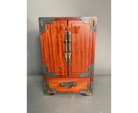 A vintage wooden Chinese jewellery box or chest with five drawers and brass fitting AF