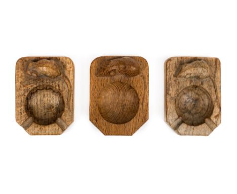 *Ashtrays. Robert "Mouseman" Thompson,  three oak ashtrays each carved with a mouse, 10.5 cm long  (3)