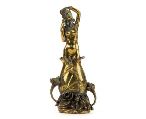 *Bronze. An early 20th century Eastern bronze figure, probably Chinese,  modelled as a female nude rising from a Lilly base, 