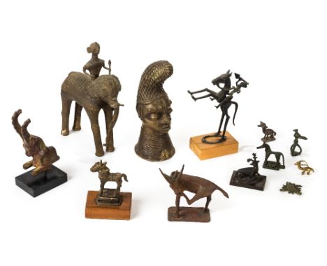 *Metalwork. A collection of African metalwork,  including a Benin bronze bust modelled in headdress and neck rings, 28 cm hig