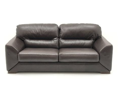  Three seat sofa upholstered in brown leather (W210cm) a pair matching armchairs (W110cm) and footstool (W85cm, H41cm, D85cm)